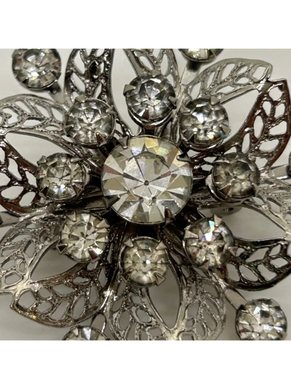 Vintage Silver Tone Rhinestone Brooch Pin Clear Crystal Floral Filigree Mid Cent